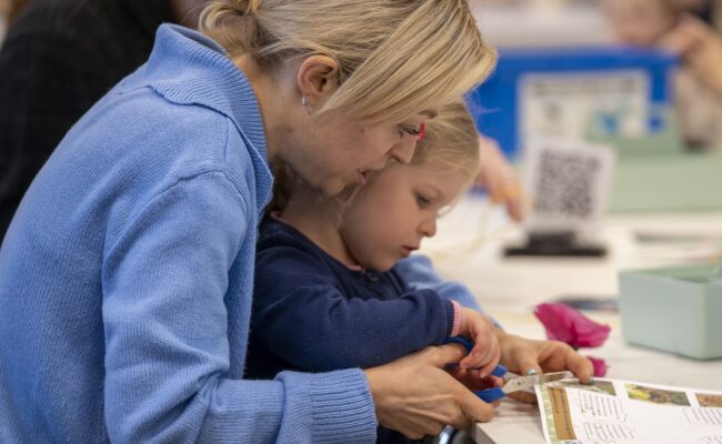 Family taking part in a craft activity at The Box, Plymouth