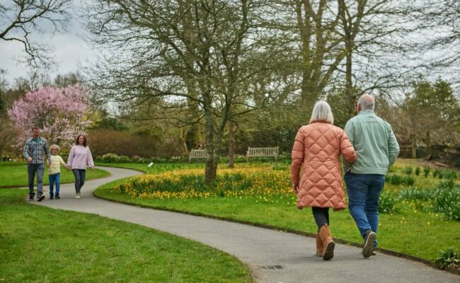 Visitors enjoying a walk in the garden at Rosemoor